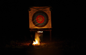 Tir de nuit et passage de flèche